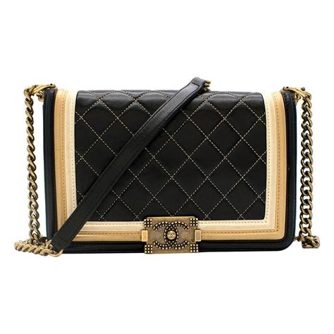 black and gold chanel boy bag